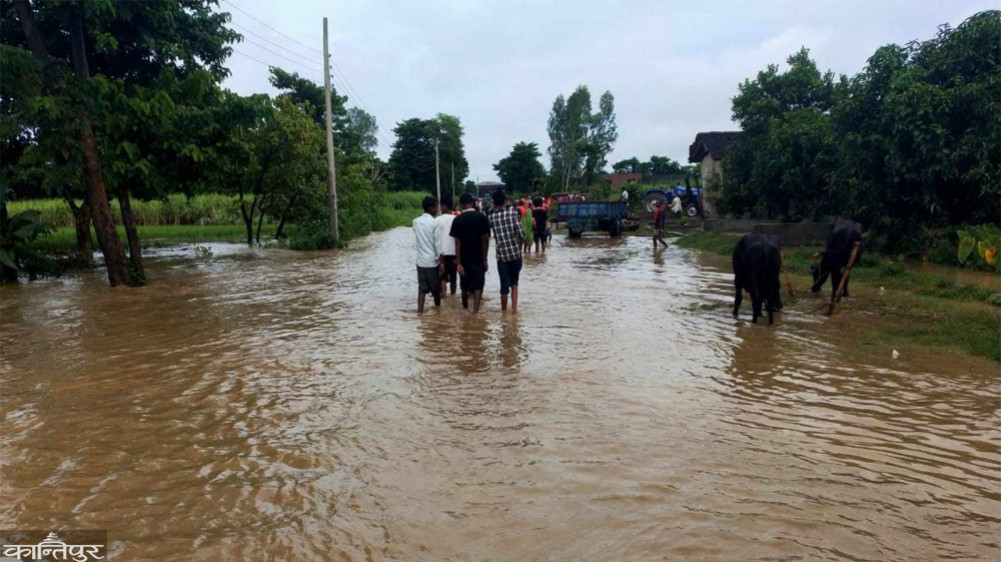 The flood of Wagmati started entering the village, moving the locals to safer places