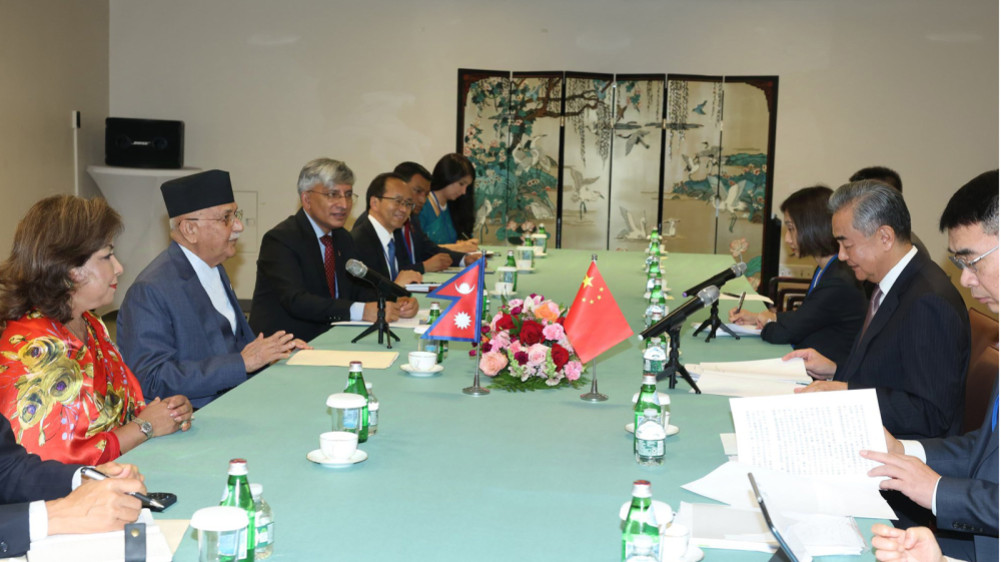 Chinese Foreign Minister Wang met Prime Minister Oli