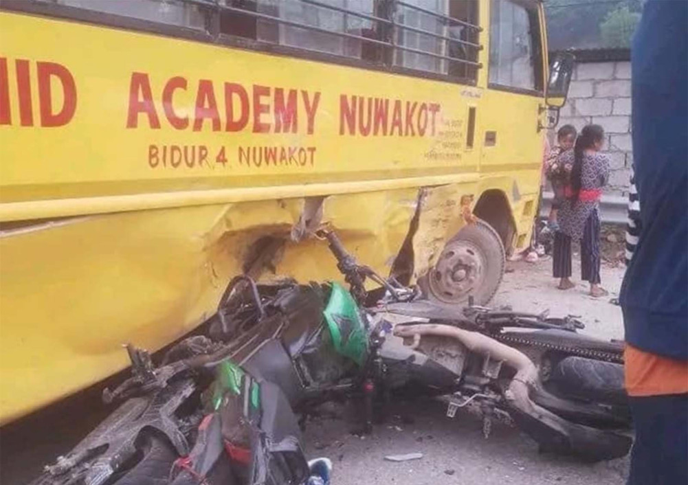 2 killed, 2 injured when school bus and motorcycle collided in Nuwakot