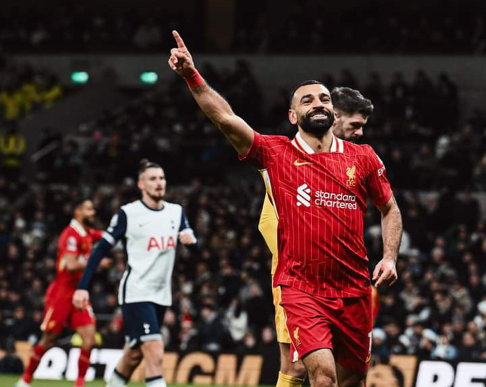 Liverpool lead by four points at the top