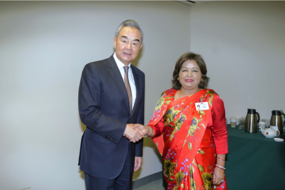 The Chinese Foreign Minister's consolation and commitment to support Nepal's floods