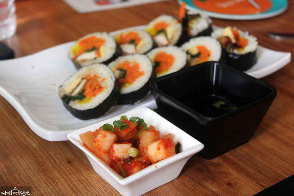 Siblings tasting kimbap