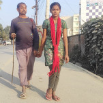 A father who has been holding his daughter's hand for 16 years