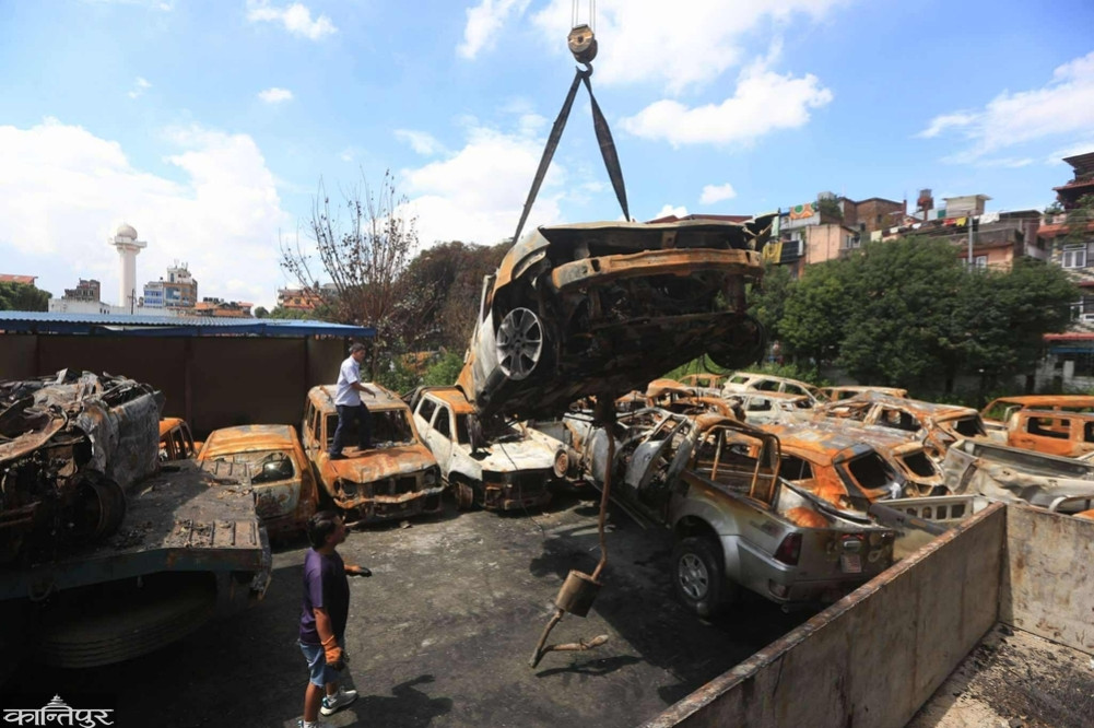 Cars burnt in Singha Darbar are being piled up in the Parliament building premises