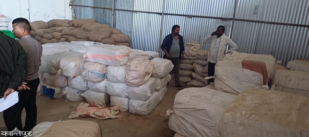More than 100 sacks of marijuana were found in the apple warehouse