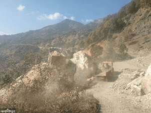 The village was filled with dust from the road