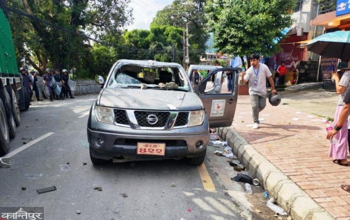 Demonstrators vandalized a government vehicle in Pokhara