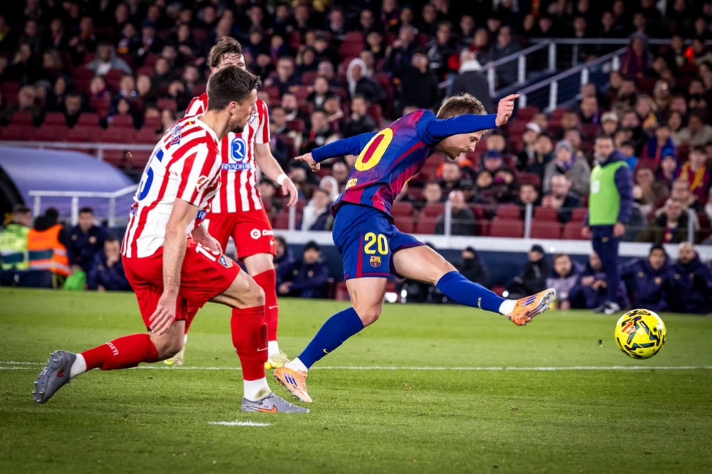 Barcelona lead the table by four points