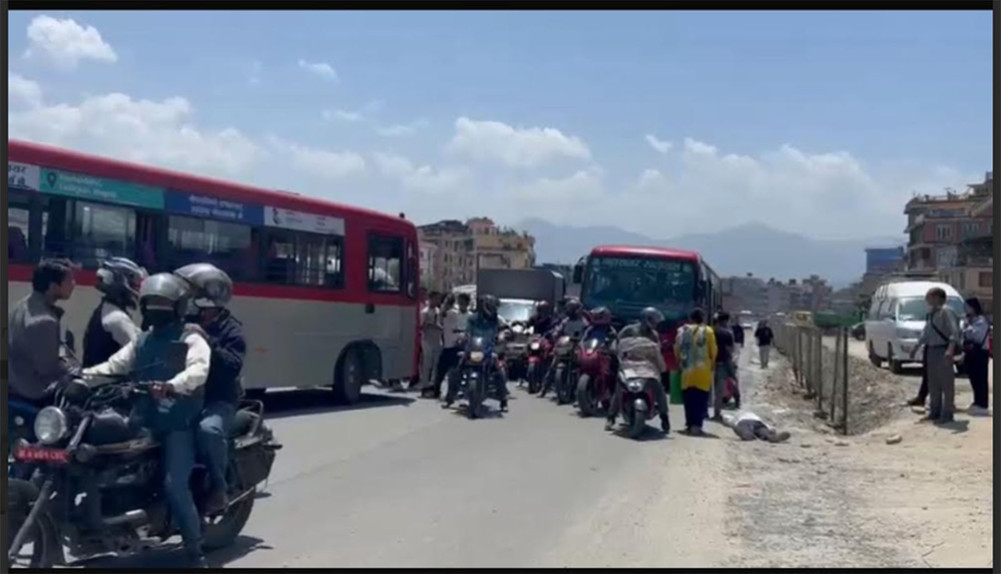 The husband was hit by a car while his wife was returning from the road