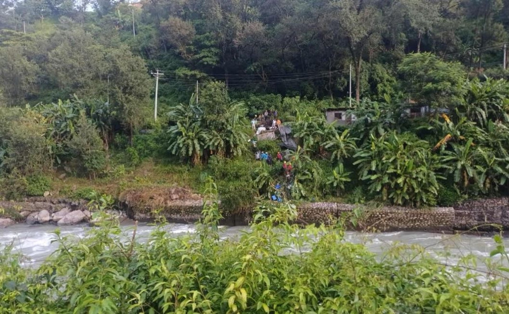 Driver missing after van falls in Bhotekoshi