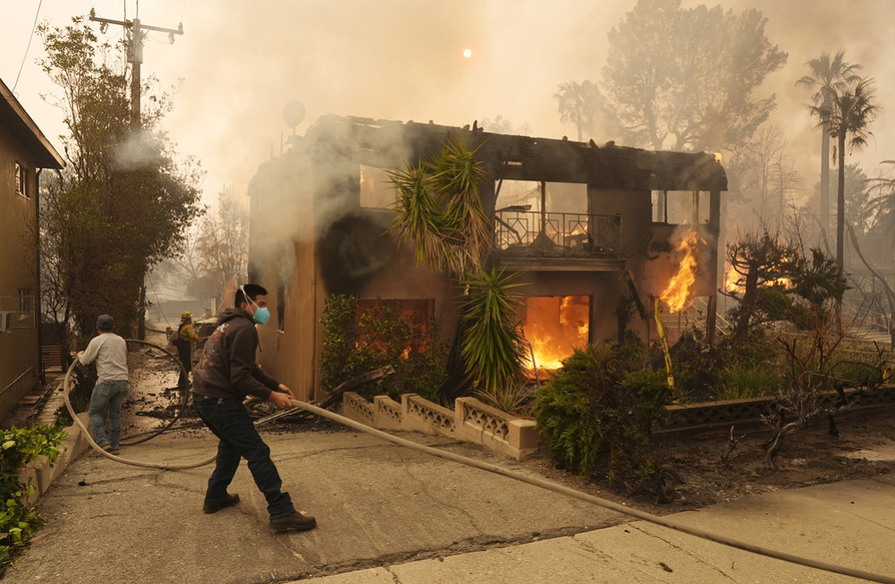 California wildfires: Death toll rises to 24, hurricane risk remains