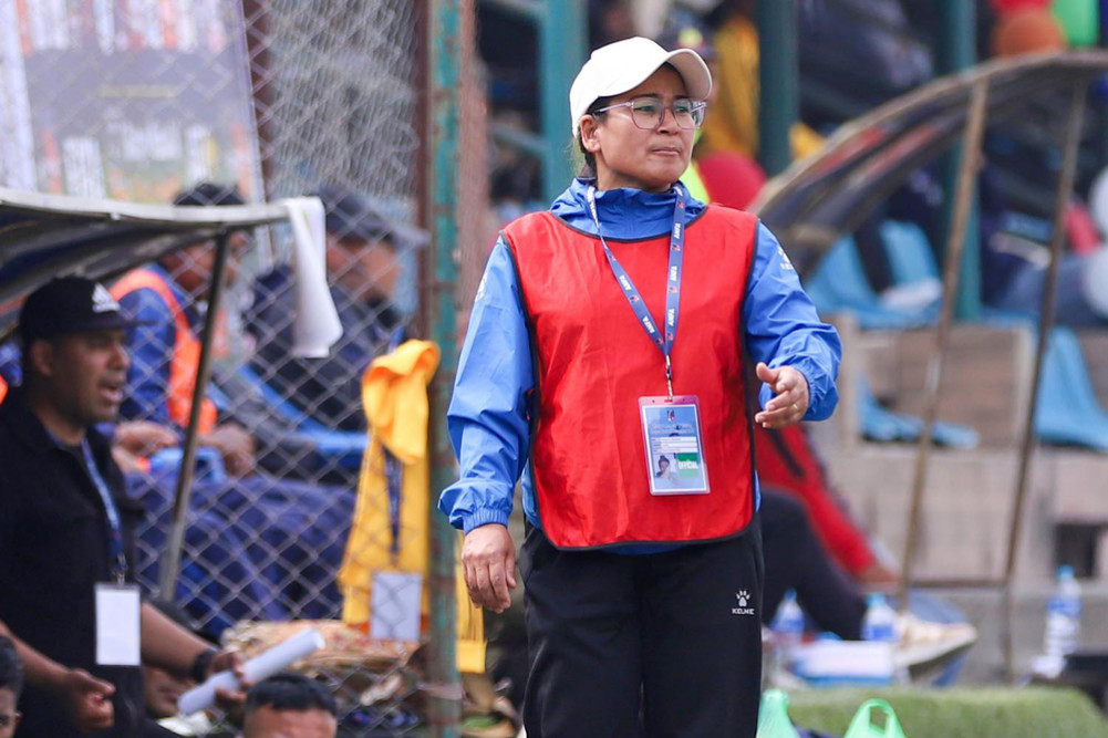 Women's coach in men's soccer