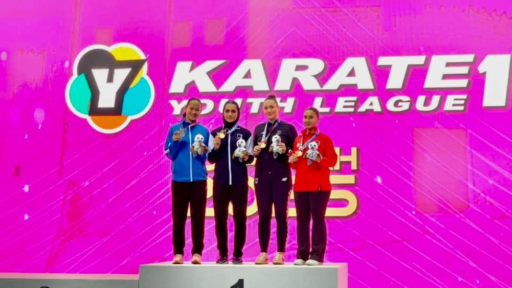 Erica won the silver medal in Kay Wan