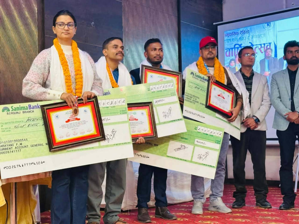 Timalsina wins first place in news reading competition