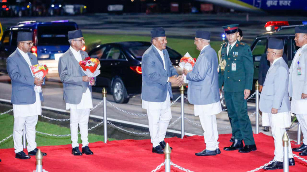 Prime Minister Oli returns home