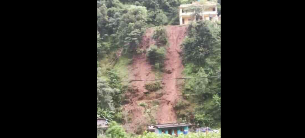 A house was damaged in Darchula when the wall of the school playground collapsed due to heavy rain