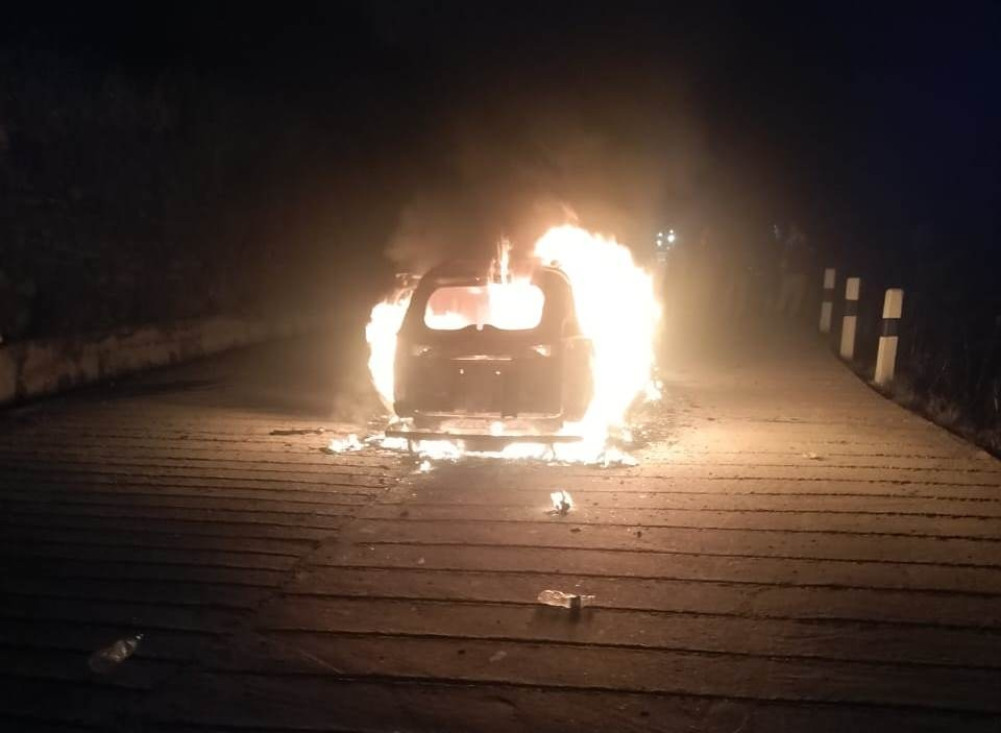 A moving car was destroyed by fire