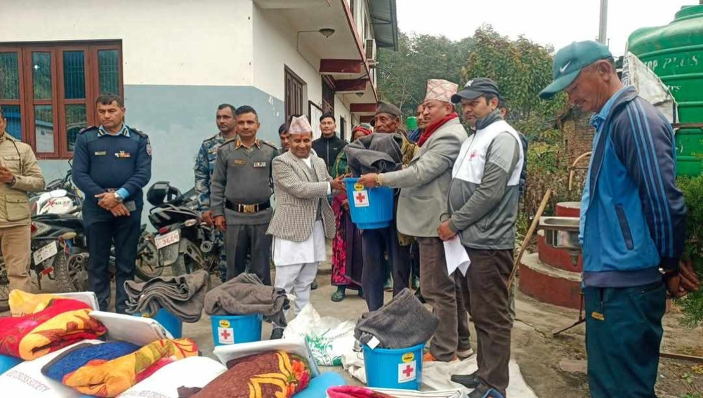 Distribution of relief to fire affected families of Shyamchet