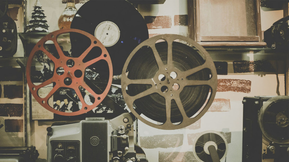 What are the benefits to the film industry when investment from business houses comes?