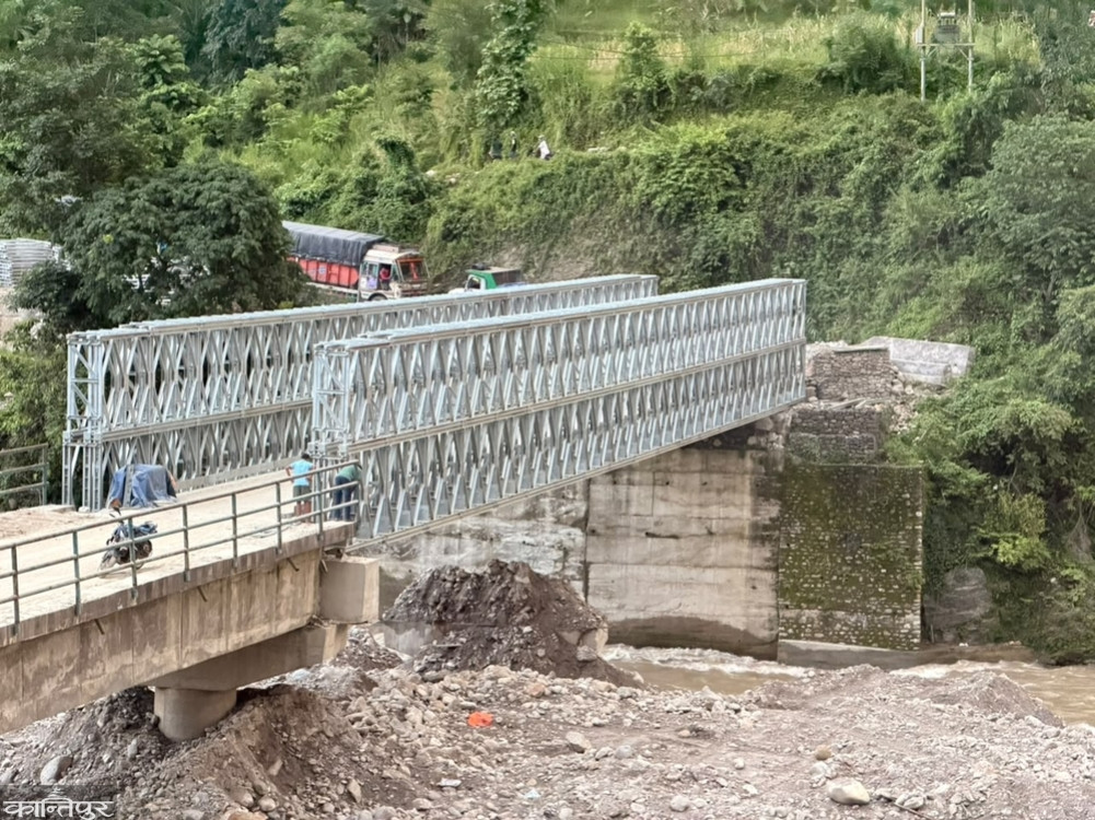 Modular bridge built on flood-sheltered structure in Maikhola