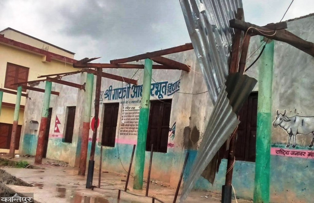 Classrooms in the open field due to lack of repair of roof blown off by wind
