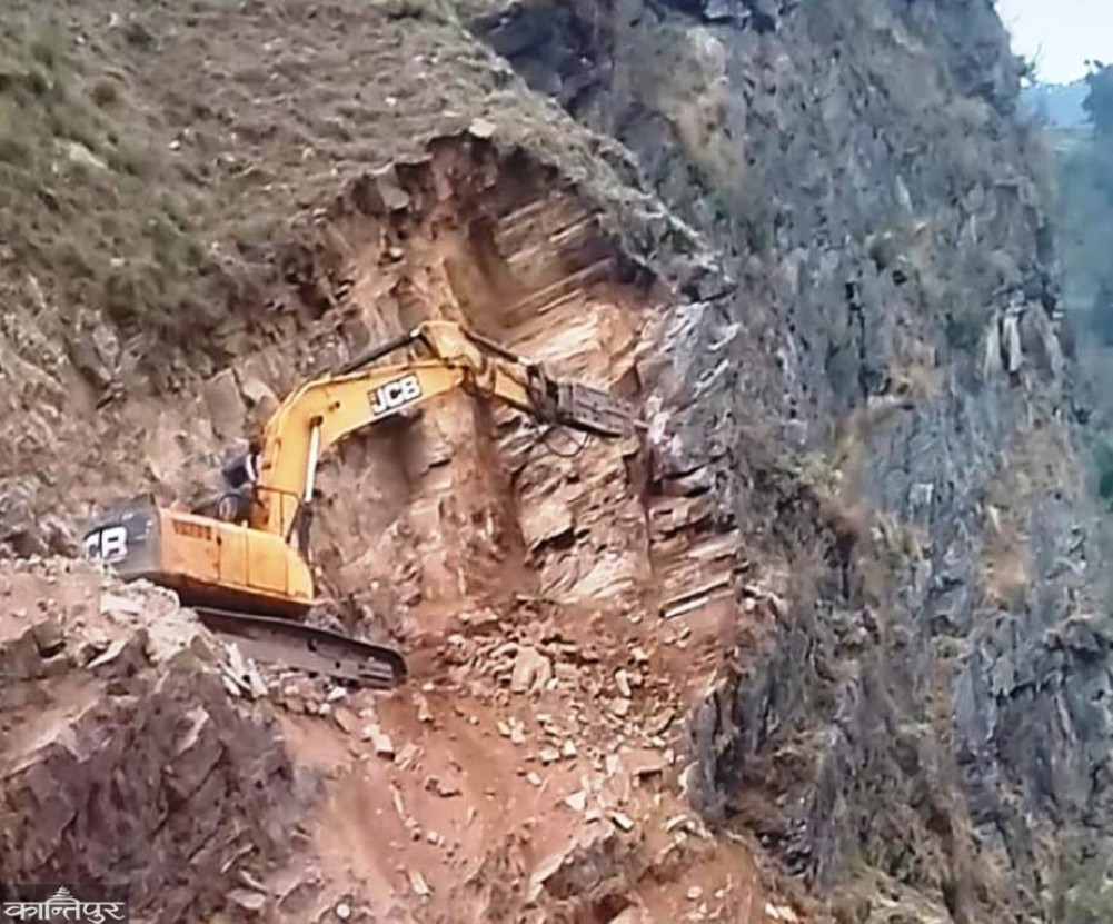 Durgam's road dream: Dozers have been tearing apart the same wall for two months