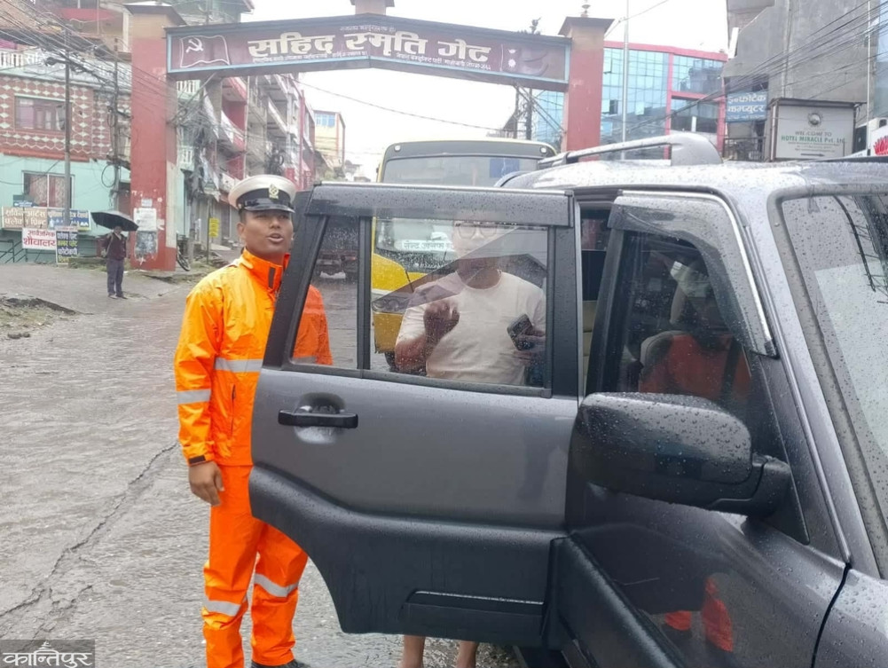 Traffic police removing tinted windows and stickers from vehicles