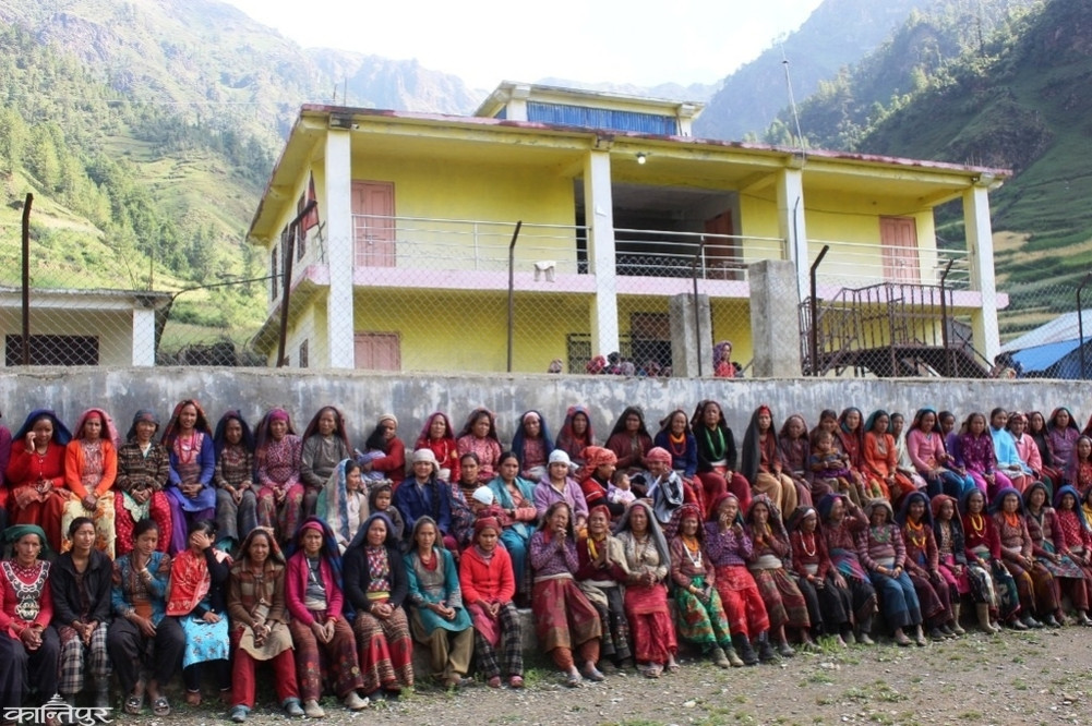 Women demolishing the 'debris' of society from a cowshed