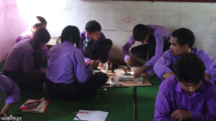 Students learning practical skills at school