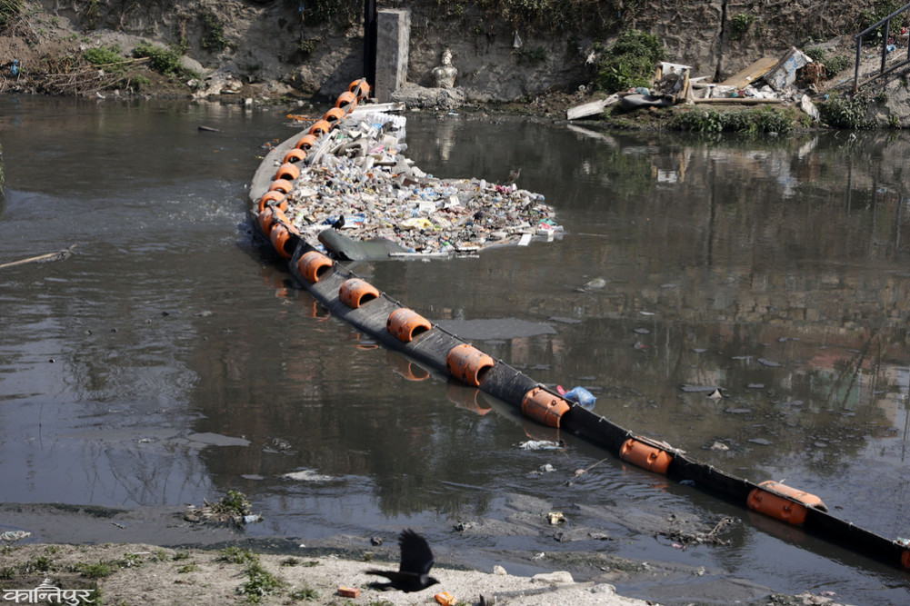 This 'barrier' has been installed to stop floating garbage in the Bagmati River.