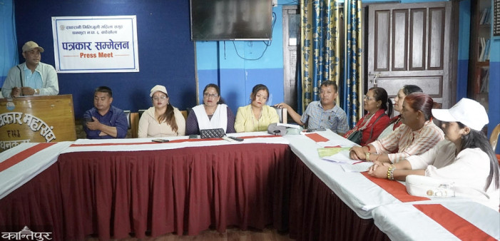 Women wear Puranas, community building to be built with savings