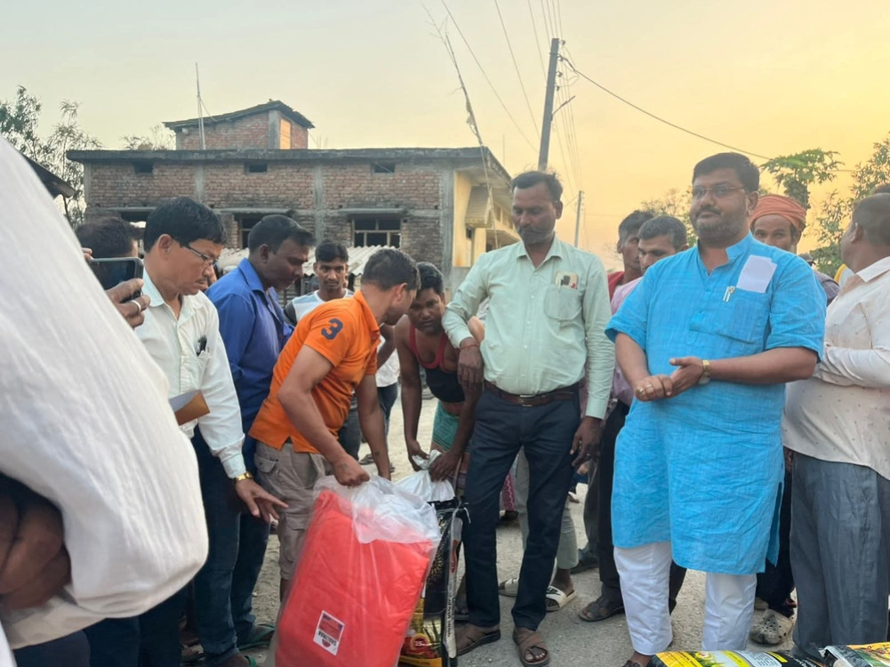 Food and cash relief distributed to 12 fire-affected families