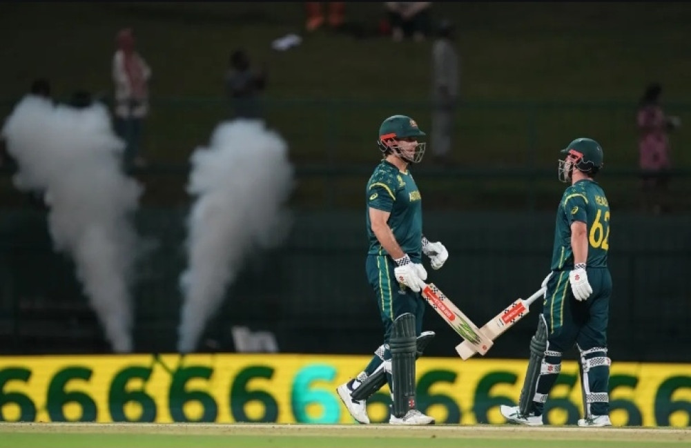 Australia returns home after defeating Oman