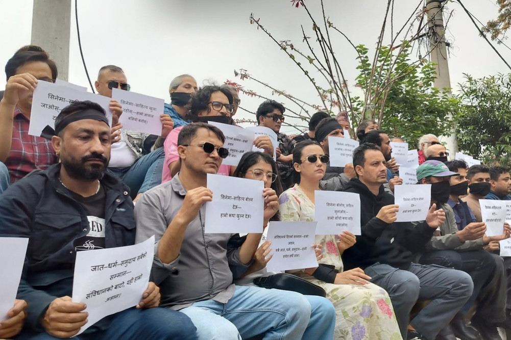 Artists in favor of freedom of expression, silent protest by wearing black armbands
