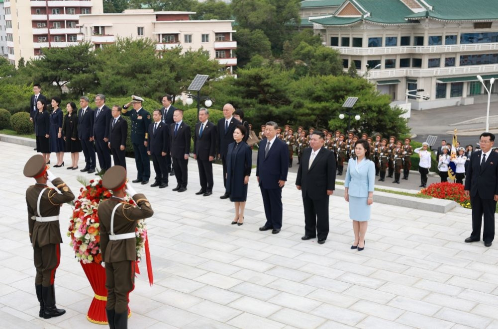 Xi, Kim agree to further strengthen ties