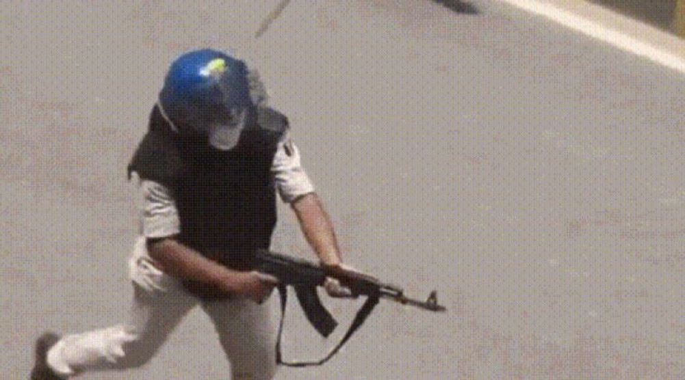 Police officer suspended for firing AK-47 at student protesters in Bihar