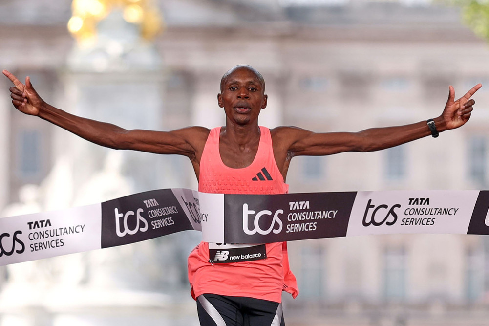Savage sets marathon world record by under two hours