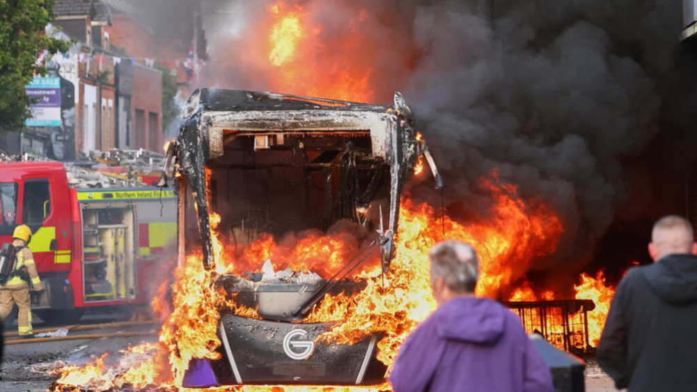Vehicles and buildings set on fire in Belfast, UK