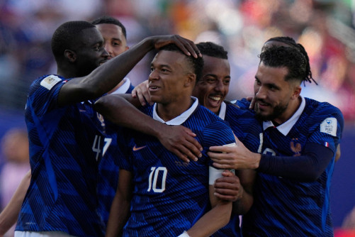 France wins on the day Mbappe sets goal record