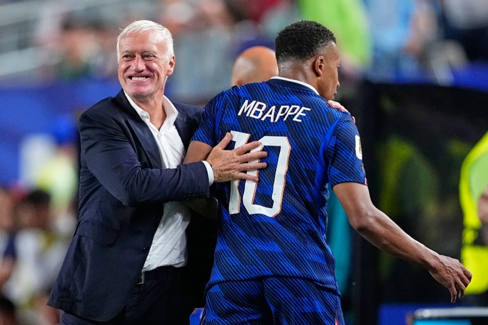 France advances to knockout stages with 3-0 win over Iraq