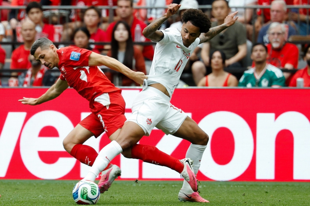 Switzerland wins group after defeating Canada