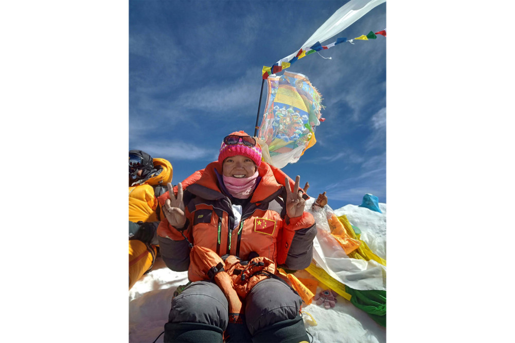 Record-breaking female mountaineer He Jing says courage has no gender