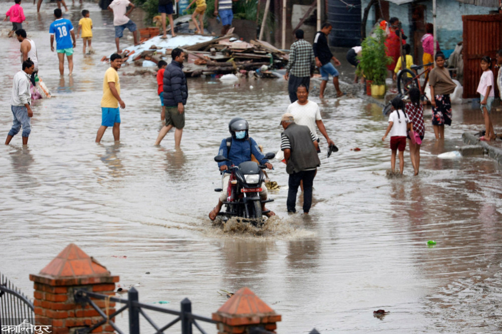 Why do Kathmandu's roads get flooded even with a little rain?