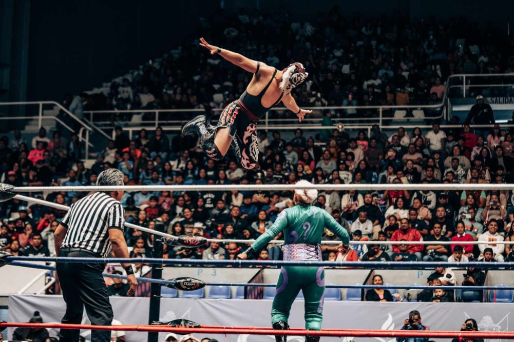 Mexico is hosting the World Cup on one side and Lucha Libre on the other.