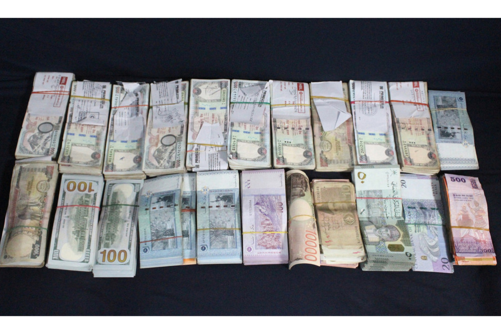 Foreign currency worth 5.2 million found with airport employee heading to Malaysia